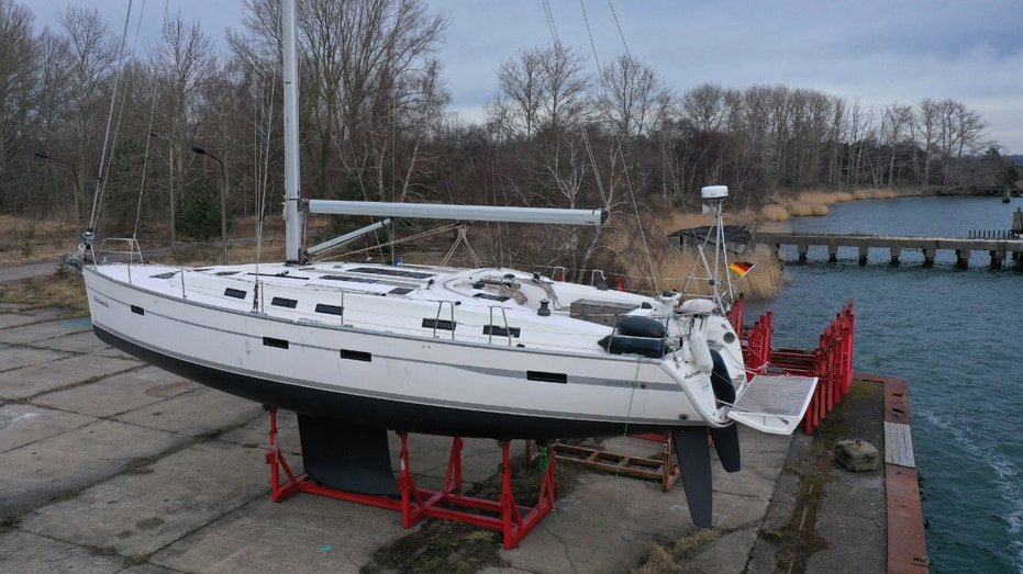 DRANSKE, GERMANY - MARCH 17: In this aerial view the Andromeda, a 50-foot Bavaria 50 Cruiser recreational sailing yacht, stands in dry dock on the headland of Bug on Ruegen Island on March 17, 2023 near Dranske, Germany. According to media reports, German investigators searched the boat recently and suspect a six-person crew used it to sail to the Baltic Sea and plant explosives that detonated on the Nord Stream pipeline in September of 2022, causing extensive damage. Investigators reportedly found traces of explosives on the table inside the yacht. While initial findings point to a possible Ukrainian connection to the sabotage operation, many questions remain open.